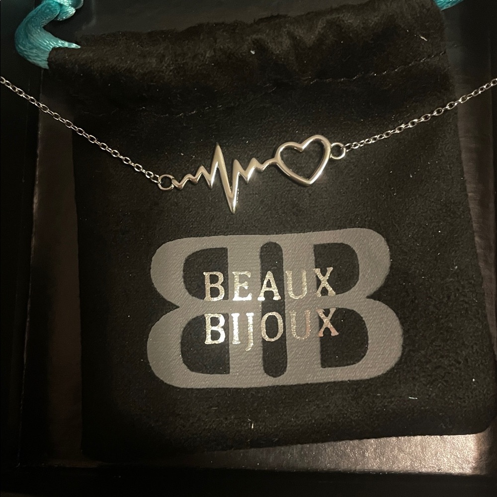 Silver heartbeat necklace